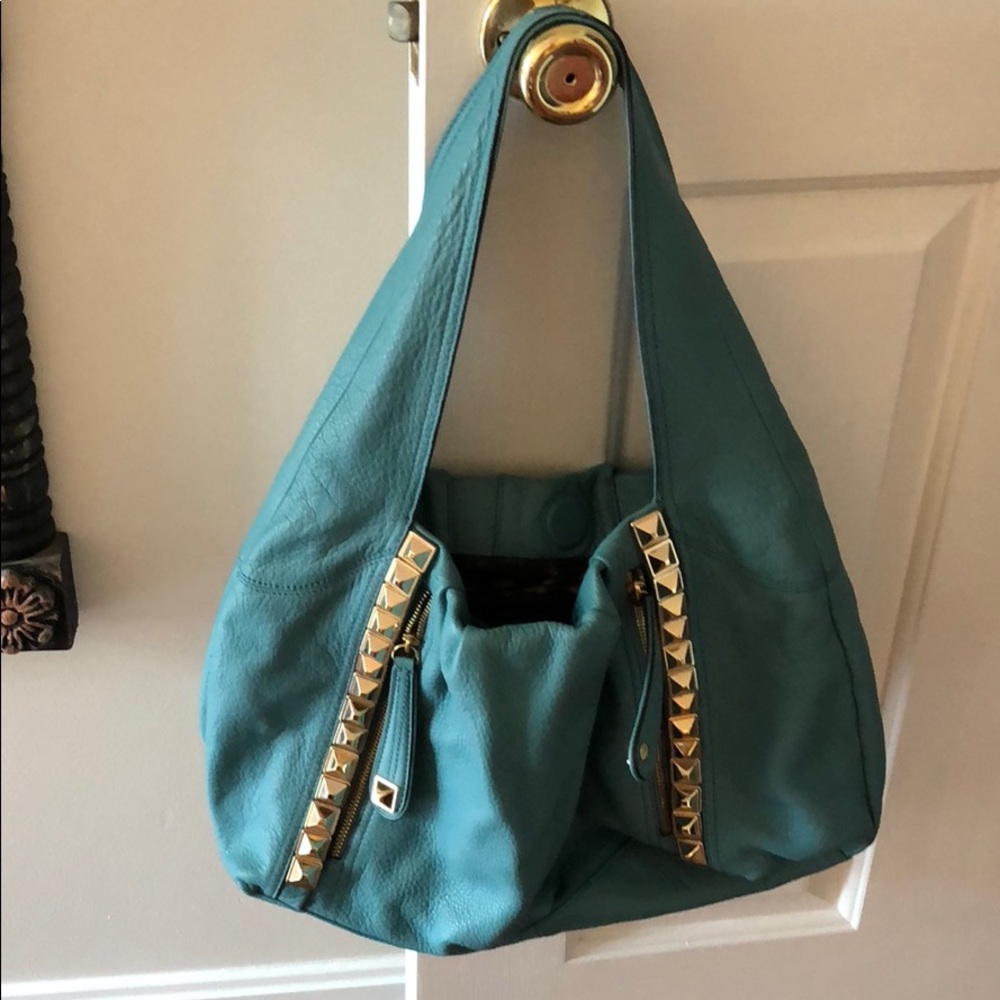Peacock blue studded leather bag